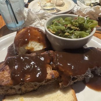 Wobbly Boots Roadhouse - Meatloaf with smashed potatoes and Green beans! Best meatloaf I've ever had. Two pieces in the order. Covered in brown gravy. - Barbeque Near Me - Osage Beach, Missouri