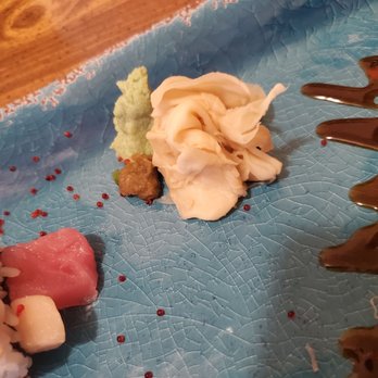 Moyashi - a plate of sushi on a blue plate - Sushi Bars Near Me - Hanover, Indiana