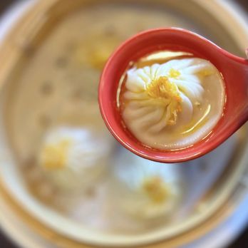 Dumpling Story - 蟹粉小笼包 Crab & Pork XLB | 4 pc - $13.95 (I poked the XLB to release some of the soup.) - Shanghainese Near Me - San Francisco, California Dumpling Story - 蟹粉小笼包 Crab & Pork XLB | 4 pc - $13.95 (I poked the XLB to release some of the soup.) - Shanghainese Near Me - San Francisco, California