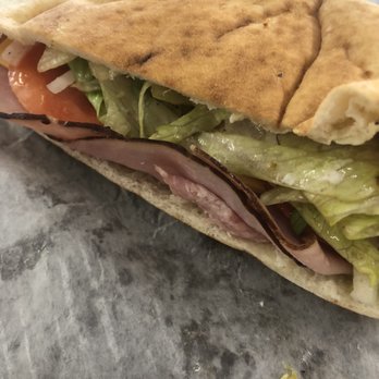 Vic's Sandwich Shop - a sandwich with meat, lettuce, and tomato - Sandwiches Near Me - Jacksonville, Florida