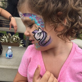 All That Glitters Paint - Unicorn face (leghorn as she called it) - Face Painting Near Me