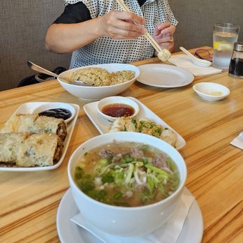 dan modern chinese - beef roll, oxtail beef noodle soup, salt & pepper tofu, and dungeness crab fried. We also ordered their juicy and yummy Xiaolongbao. - Chinese Near Me - Manhattan Beach, California