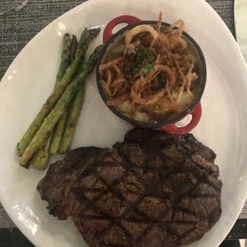 Hamptons - Ribeye with loaded mashed potatoes and asparagus - Wine Bars Near Me - Sumter, South Carolina Hamptons - Ribeye with loaded mashed potatoes and asparagus - Wine Bars Near Me - Sumter, South Carolina