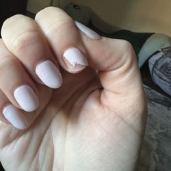 LK Signature Nails & Spa - Color I got (white tinted slightly purple) - this dip mani sheered off in a sharp ragged way. Dip is not strong (old discolored product).