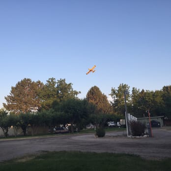 Anderson Camp - Crop duster in the evening - RV Parks Near Me - South Eden, Idaho