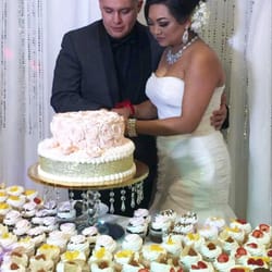 Cutting our cake as husband and wife.. Everything look and taste so good!! U the BEST!!!!