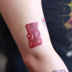 Artistic Binge Studio - Gummy bear realism tattoo by Jorge