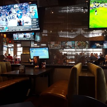 Bombshells Restaurant & Bar - Multiple TVs within view. - Sports Bars Near Me - Houston, Texas