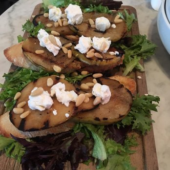 Queer Bar - Seasonal pear crostini. - Gay Bars Near Me - Seattle, Washington