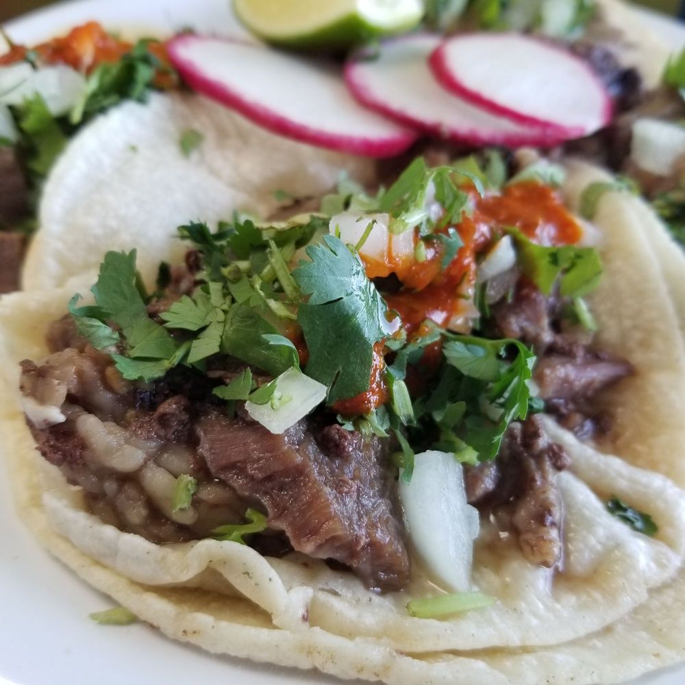 Tacos El Rey Taqueria Logo