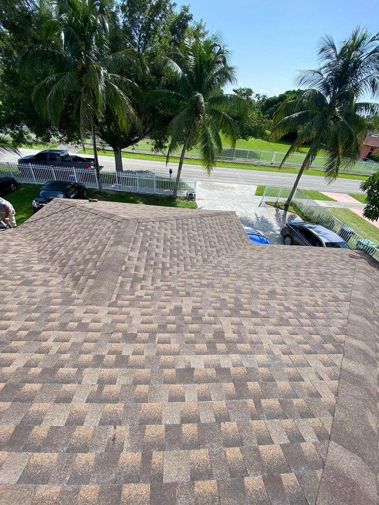 Slide of JMR Roofing Services