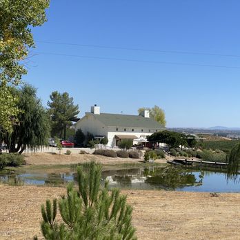 Graveyard Vineyards - View of the tasting room from across the pond. - Wine Tasting Room Near Me - San Miguel, California Graveyard Vineyards - View of the tasting room from across the pond. - Wine Tasting Room Near Me - San Miguel, California
