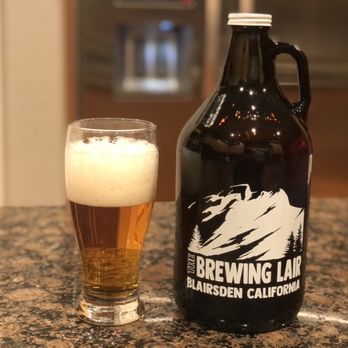The Brewing Lair - a bottle of beer next to a glass of beer - Breweries Near Me - Blairsden, California The Brewing Lair - a bottle of beer next to a glass of beer - Breweries Near Me - Blairsden, California
