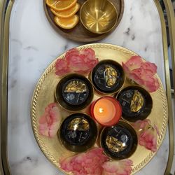 Nail Spa - Luxurious pedicure oils, orange slices and rose petals.