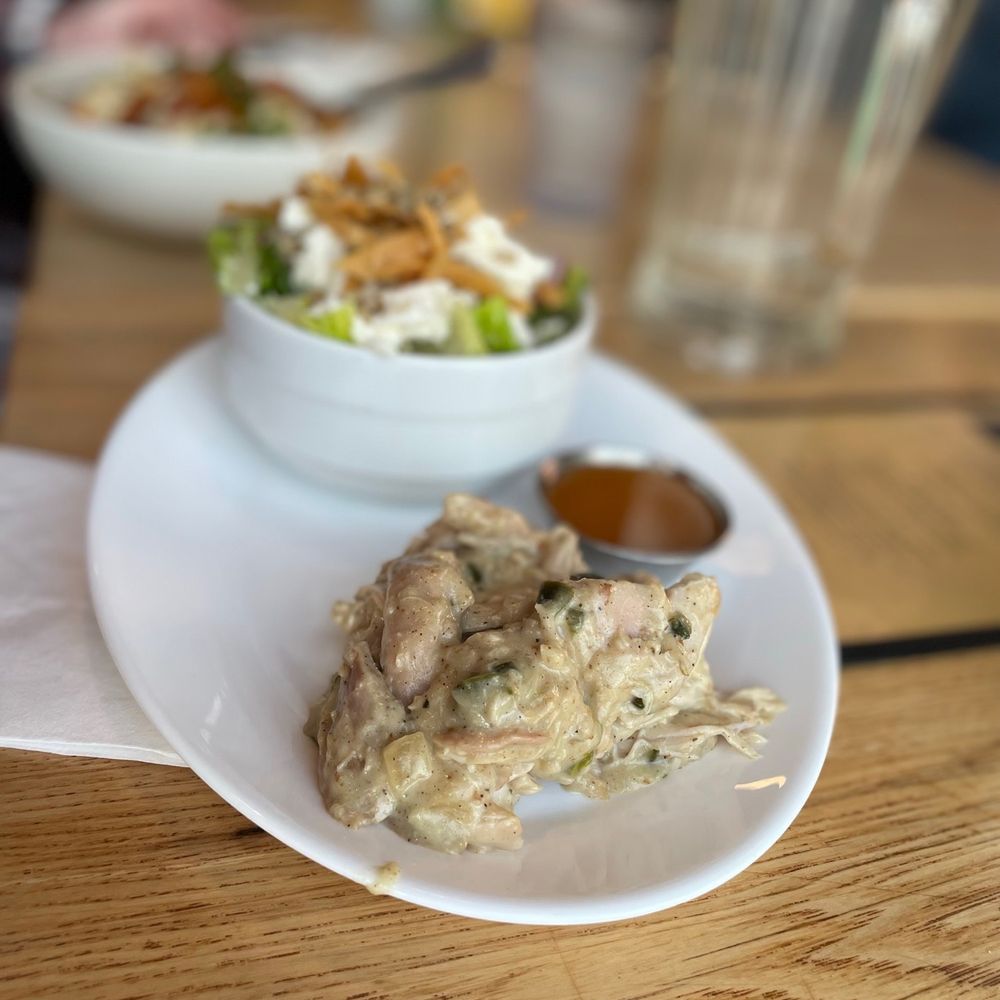 Brasa - a plate of food on a table - Southern Near Me - Minneapolis, Minnesota Brasa - a plate of food on a table - Southern Near Me - Minneapolis, Minnesota