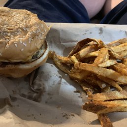 Cheeseburger with Cajun fries . Cheeseburger with Cajun fries .