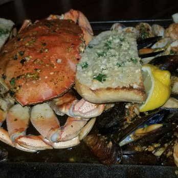 Pier 402 - Garlic Iron Skillet whole crab, lots of prawns, clams,mussels & garlic bread - Seafood Near Me - San Jose, California Pier 402 - Garlic Iron Skillet whole crab, lots of prawns, clams,mussels & garlic bread - Seafood Near Me - San Jose, California