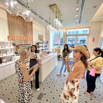 LATHER - Jacqueline teaching us about the shop and owner and products during our pamper party! - Cosmetics & Beauty Supply Near Me - Pasadena, California