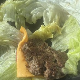 Lettuce wrap cheese burger $13.95, I took one bite. Lettuce wrap cheese burger $13.95, I took one bite.
