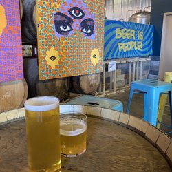 The Slough Brewing Collective - Arpeggio (left) and half pour of crooked symmetry (right)