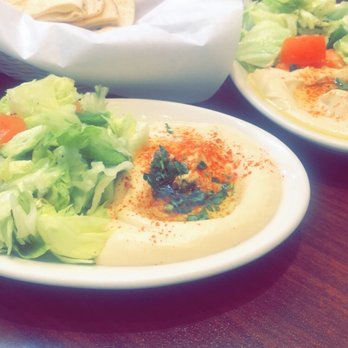Taboon Mediterranean - Hummus and salad that comes with the entree - Mediterranean Near Me - Long Beach, California Taboon Mediterranean - Hummus and salad that comes with the entree - Mediterranean Near Me - Long Beach, California