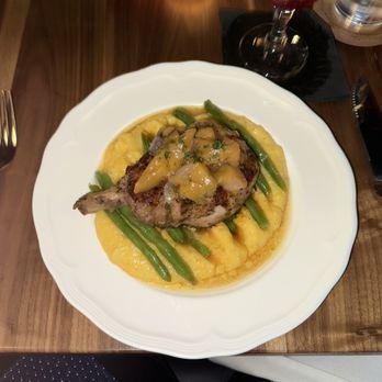 Aubrey - Berkshire pork chop.  It was juicy and flavorful. - American Near Me - St. Louis, Missouri