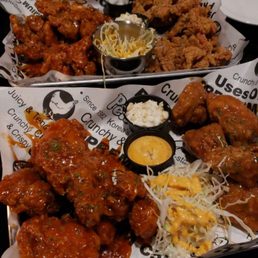 Top: half spicy (lvl 2) and half regular Bottom: half spicy (lvl 2) and half honey garlic