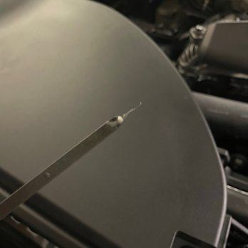 Mike Shaw Subaru - The dipstick with no oil on it - Car Dealers Near Me - Thornton, Colorado