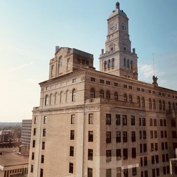 UP Skybar - a tall building with a clock tower - Cocktail Bars Near Me - Davenport, Iowa