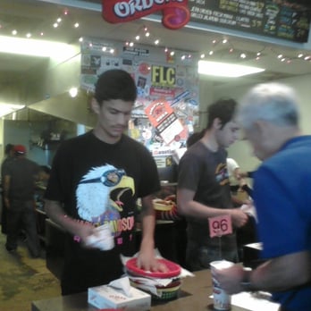 Torchy's Tacos - unsanitized bottoms of baskets stacked on top of clean separator sheets! - Tex-Mex Near Me - Austin, Texas