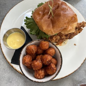 Young Cardinal Cafe - Hot honey chicken sandwich with sweet potato tots - Breakfast & Brunch Near Me - Winston-Salem, North Carolina Young Cardinal Cafe - Hot honey chicken sandwich with sweet potato tots - Breakfast & Brunch Near Me - Winston-Salem, North Carolina