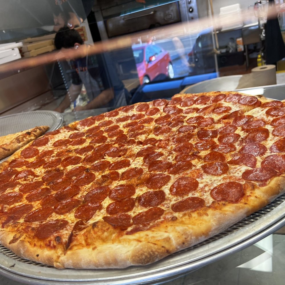 Super Slice Pizza - Pizza to choose from in the front case ready to meet your craving. - Pizza Near Me - El Cerrito, California Super Slice Pizza - Pizza to choose from in the front case ready to meet your craving. - Pizza Near Me - El Cerrito, California