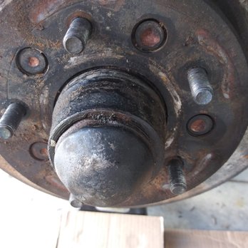 Midas - Factory rivets still installed, this rotor was not replaced but they charged me for it. - Auto Repair Near Me - Tustin, California Midas - Factory rivets still installed, this rotor was not replaced but they charged me for it. - Auto Repair Near Me - Tustin, California