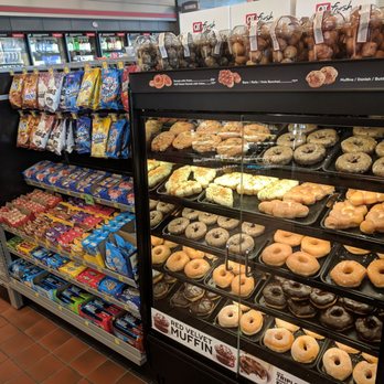 QuikTrip - a display of donuts in a store - Gas Stations Near Me - Fort Worth, Texas QuikTrip - a display of donuts in a store - Gas Stations Near Me - Fort Worth, Texas