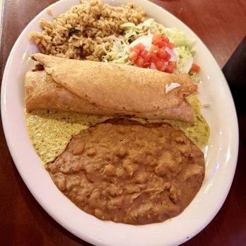 Chuy's - Chimichanga (Chuychanga) with boom boom sauce, Green Chile Rice, and Refried Beans. Best Chimi - Crispy and Filled. - Tex-Mex Near Me - Orlando, Florida Chuy's - Chimichanga (Chuychanga) with boom boom sauce, Green Chile Rice, and Refried Beans. Best Chimi - Crispy and Filled. - Tex-Mex Near Me - Orlando, Florida