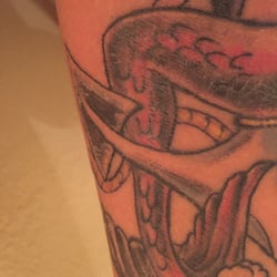 Inkers East Tattoo - The outlining is not only horrible, but doesn't even line up