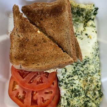 Prime Grill - Spinach and Feta Cheese Omelette made with egg whites, sides of wheat toast and tomato slices - American Near Me - Livonia, Michigan Prime Grill - Spinach and Feta Cheese Omelette made with egg whites, sides of wheat toast and tomato slices - American Near Me - Livonia, Michigan