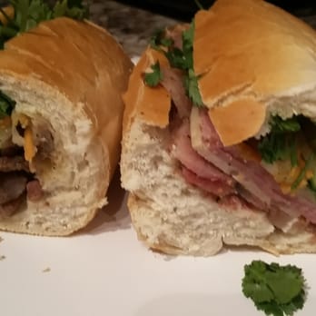 Pho Nu Cuoi Saigon - So good ham combo sandwich on the right and grilled pork roll on the left. - Vietnamese Near Me - Woodbridge, Virginia Pho Nu Cuoi Saigon - So good ham combo sandwich on the right and grilled pork roll on the left. - Vietnamese Near Me - Woodbridge, Virginia