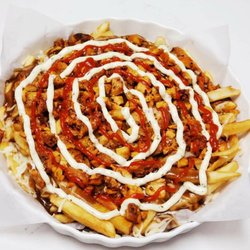 Crustos Pizza & Wings - Got great selection for Poutine..
The one here is our signature Chicken Shawarma Poutine