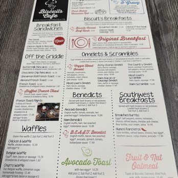Biscuits Cafe - Menu page 1 - The menu page from Biscuits Cafe includes sections for breakfast sandwiches, waffles, Benedicts, omelets, and sides. It lists various breakfast sandwiches such as chicken apple & avocado, and breakfast steak, along with waffle options like chicken & waffle and Belgian waffle. Benedicts include avocado, ham, and B.C.A.T. Benedict, with detailed descriptions and prices. The menu also features a breakfast burrito and fruit & nut oatmeal, with a clean, organized layout and clear font. The top left corner displays the Biscuits Cafe logo, and the menu emphasizes breakfast and brunch offerings. - Breakfast & Brunch Near Me - Peoria, Arizona