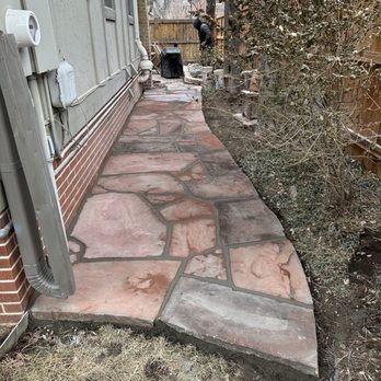Harvester Landscapes - Flag stone walkway with French drain underneath (pardon the winter picture) - Landscaping Near Me - Denver, Colorado Harvester Landscapes - Flag stone walkway with French drain underneath (pardon the winter picture) - Landscaping Near Me - Denver, Colorado