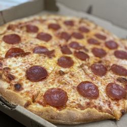 New York Pizza Ocean Springs - a classic pepperoni pizza.