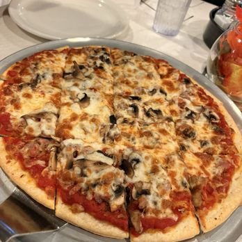 Pizzeria Ora - Chicago Style Pizza - Sausage & mushroom thin crust - Pizza Near Me - Chicago, Illinois Pizzeria Ora - Chicago Style Pizza - Sausage & mushroom thin crust - Pizza Near Me - Chicago, Illinois