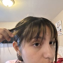 Letty's Hair Design - Left side of bangs chunk that was cut off