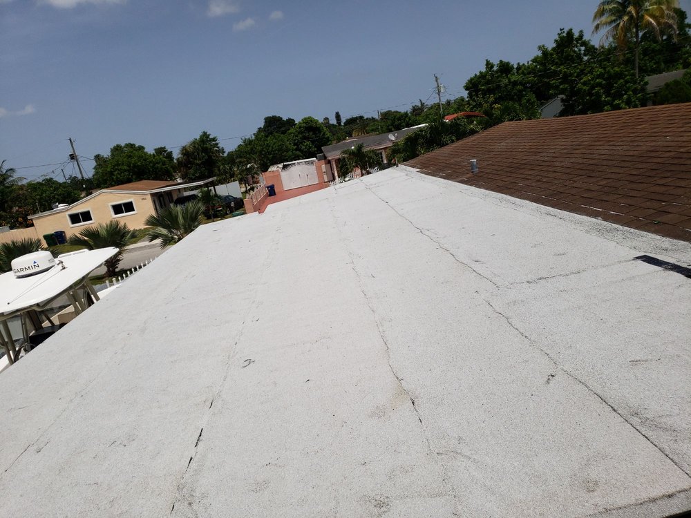 Slide of Dynasty Roofing