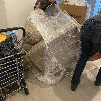 Reliable Moving Services - Wrapped couch (partially unwrapped on purpose) - Movers Near Me Reliable Moving Services - Wrapped couch (partially unwrapped on purpose) - Movers Near Me