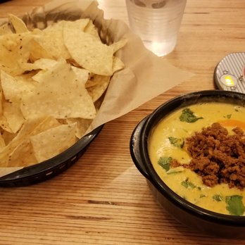Torchy's Tacos - Hillbilly Queso (Queso w/Chorizo) - Tacos Near Me - Denton, Texas Torchy's Tacos - Hillbilly Queso (Queso w/Chorizo) - Tacos Near Me - Denton, Texas