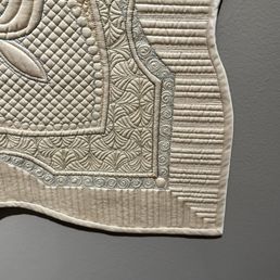 Detailed quilting. Detailed quilting.