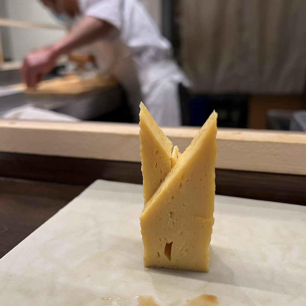 Utzutzu - a chef in the background - Sushi Bars Near Me - Alameda, California Utzutzu - a chef in the background - Sushi Bars Near Me - Alameda, California