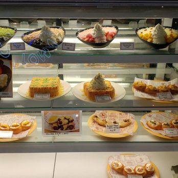 Tom N Toms Coffee - a display of various desserts - Coffee & Tea Near Me - Carrollton, Texas